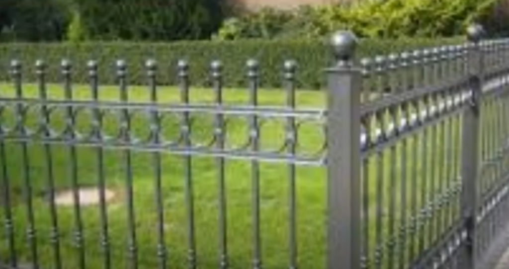 How do you anchor a wrought iron fence